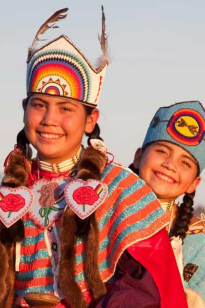 These vibrant individuals, part of Indigenous communities living on designated lands, are NEI's focus.